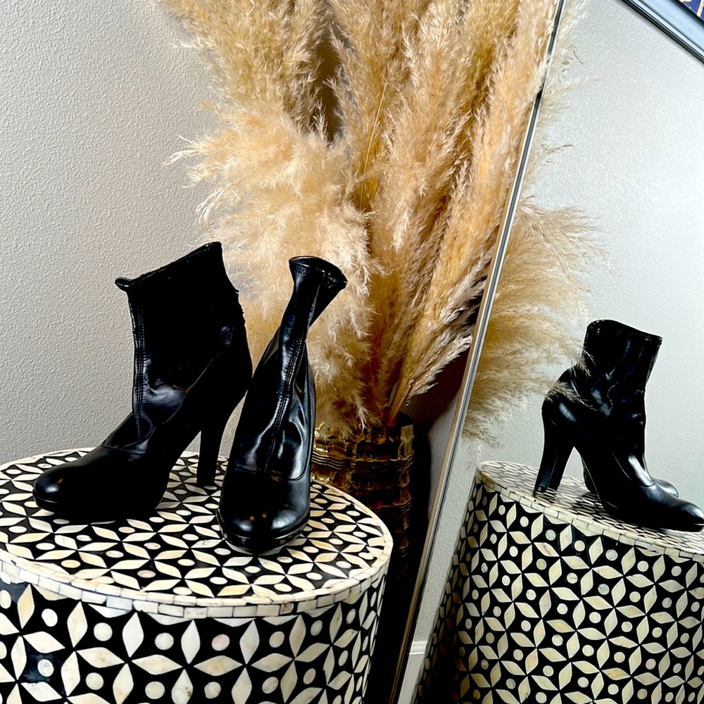 Slay with these black heeled beauties/ booties by Nine West!